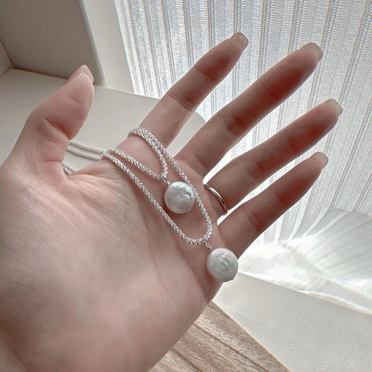 Silver Round Whispering Waves Pendant
